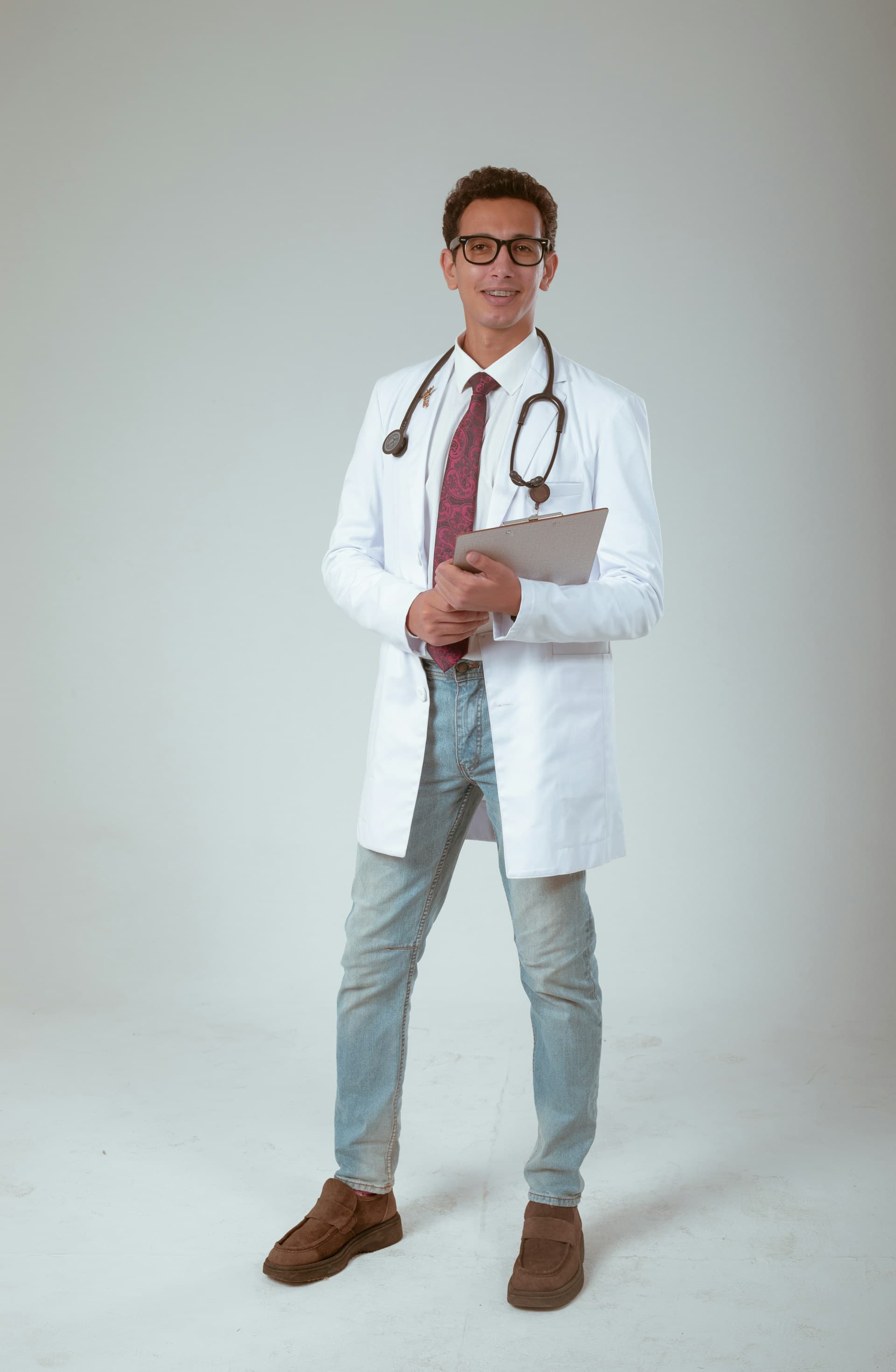 Male physician in a white coat